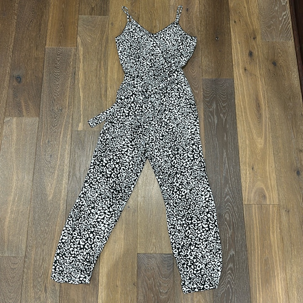 Small black and white cheetah romper like new